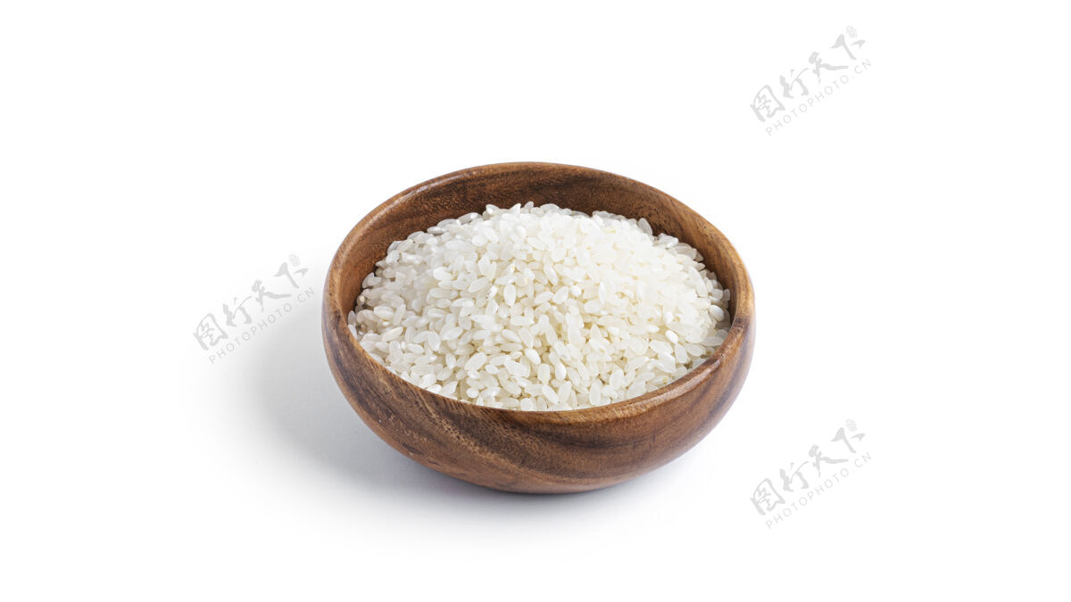 小吃木碗里的米饭被隔离在一个白色的盘子里背景高高质量的照片有机食物米饭